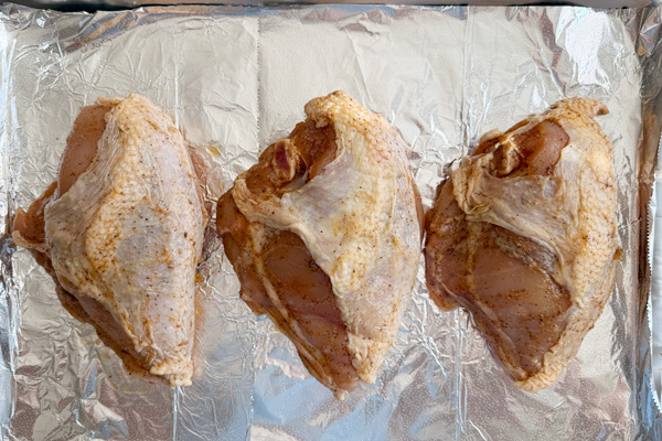 Chicken split breast: seasoned with salt, pepper, garlic powder, paprika.