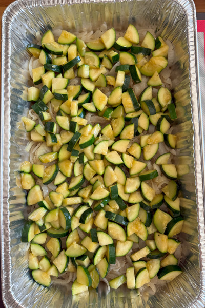 Glazed Meatball Assembling Step 2 middle layer of zucchini squash stir-fried with steak seasoning.