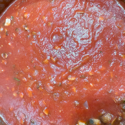 Tomato Meatball Pasta Sauce: add tomato sauce, mushroom, herbs, pepper, salt, and boil in pot .