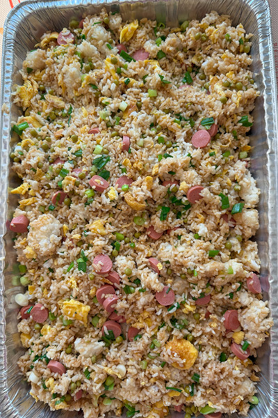 Stir-fry Rice: cooked white rice, eggs, green onion, sausage, snow peas, garlic powder, soy sauce.